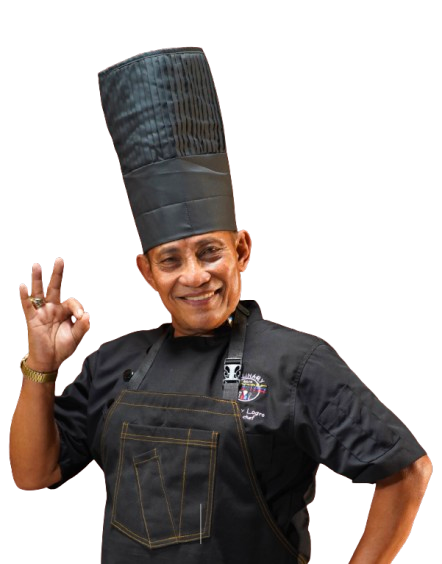 Chef in black uniform and hat making an OK gesture with a smile.
